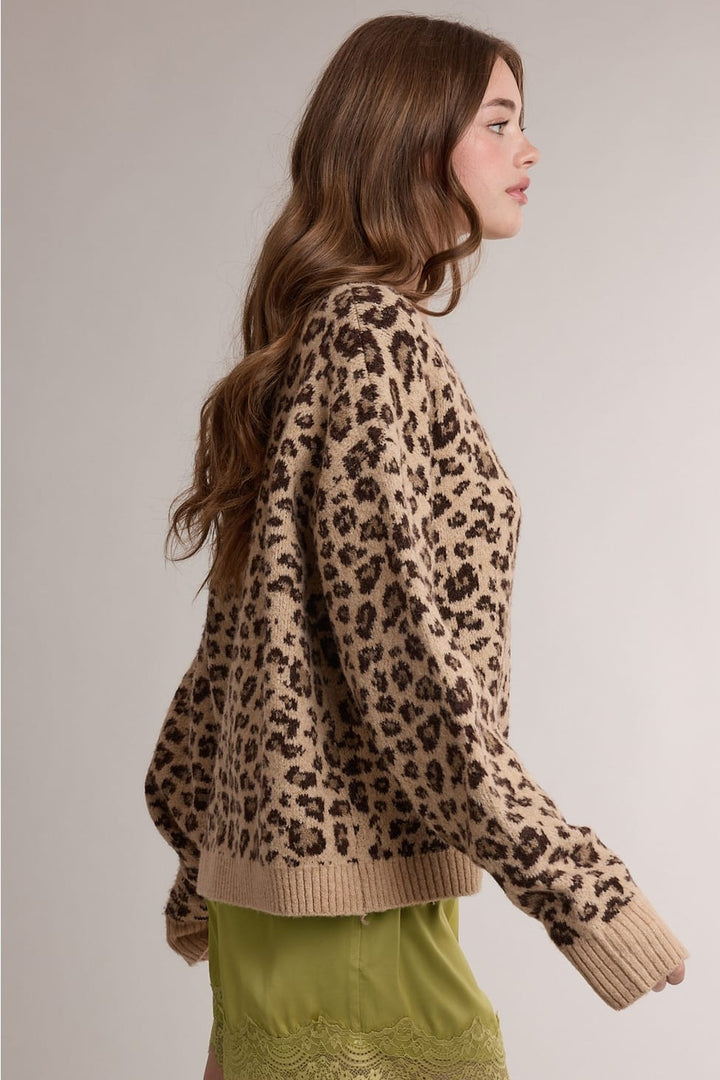Leopard print knit cardigan with a relaxed boxy fit and dropped shoulders
