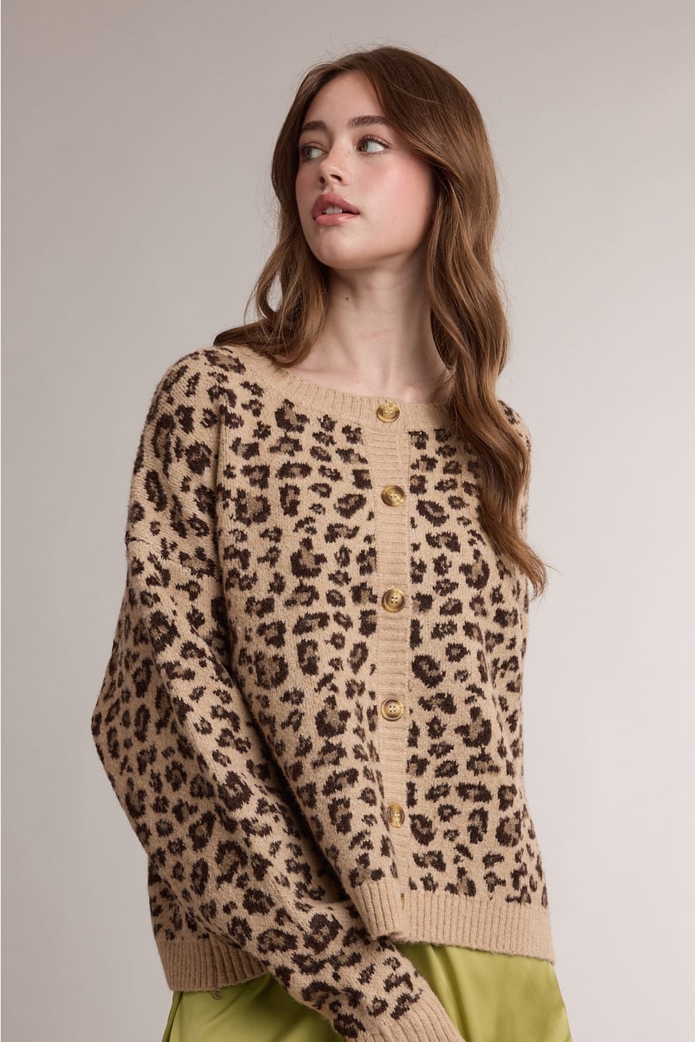 Cozy leopard print button-front cardigan styled for fall at The Red Owl