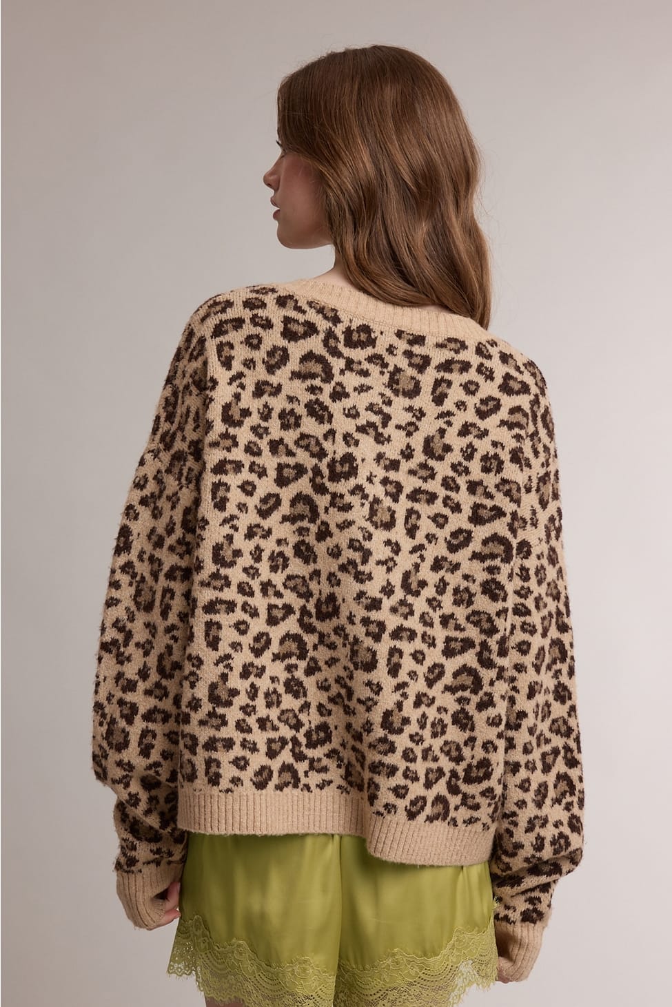 Camel and brown leopard cardigan sweater with ribbed crew neck, cuffs and hem