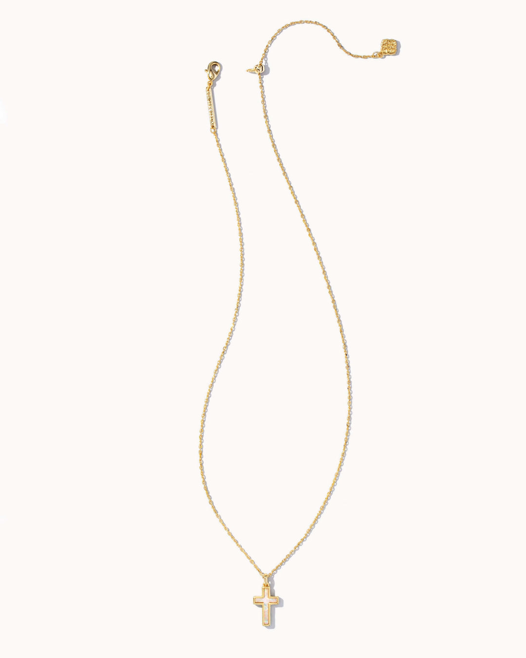 Kendra Scott Cross Gold Pendant Necklace in White Kyocera Opal Kendra Scott White Kyocera Opal Gold Cross Necklace Necklaces